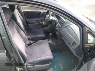 2003 Suzuki Aerio S z VIN JS2RA41S135158128, wystawiony jako IAAI lot #41425178 z przebiegiem 166 019 mil mil oraz . Historia ofert i sprzedaży dostępna na DreamBid. Obrazek 5.