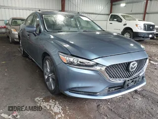 2018 Mazda Mazda6 Touring with VIN JM1GL1VM6J1313332, listed as a IAAI auction lot 41904791 with 71,558 mi miles. Bid and sale history available at carsss.com. Image 1.