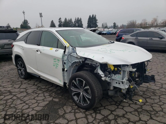 2020 Lexus RX 350L with VIN JTJHZKEA6L2014576, listed as a Copart auction lot 82706154 with 59,775 mi miles and Salvage title. Bid and sale history available at DreamBid. Image 4.