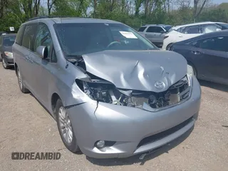 2014 Toyota Sienna XLE with VIN 5TDYK3DC9ES413283, listed as a IAAI auction lot 42091379 with 184,506 mi miles and . Bid and sale history available at DreamBid. Image 6.