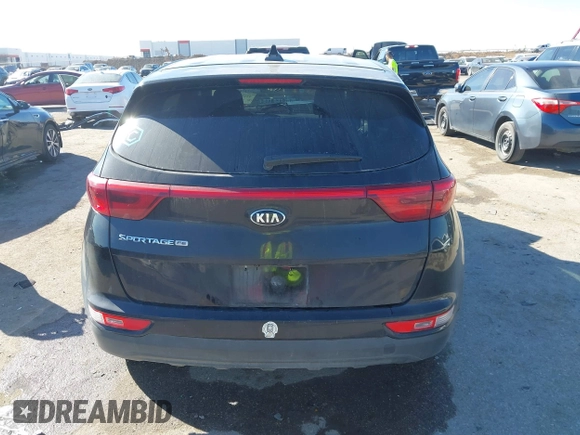 2019 Kia Sportage LX with VIN KNDPM3AC4K7534271, listed as a IAAI auction lot 41696261 with 71,386 mi miles. Bid and sale history available at carsss.com. Image 16.