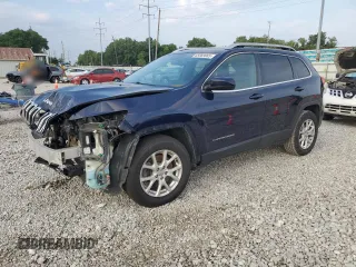 2016 Jeep Cherokee Latitude z VIN 1C4PJMCS8GW256037, wystawiony jako Copart lot #65969985 z przebiegiem 143 645 mil mil oraz Szkoda całkowita • Salvage title. Historia ofert i sprzedaży dostępna na DreamBid. Obrazek 1.