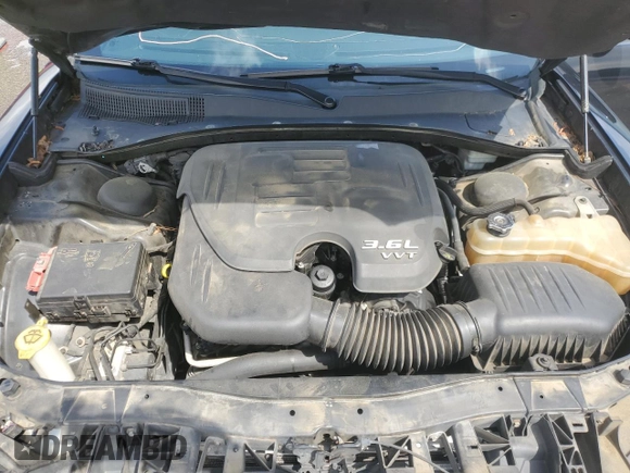 2012 Dodge Charger SE with VIN 2C3CDXBG8CH177291, listed as a Copart auction lot 52918675 with 127,560 mi miles and Salvage Title. Bid and sale history available at DreamBid. Image 11.
