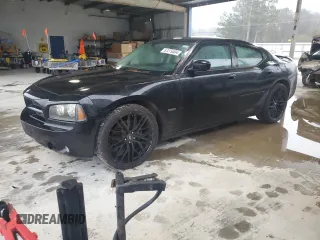 2010 Dodge Charger R/T with VIN 2B3CA5CT9AH156470, listed as a Copart auction lot 87279304 with 206,789 mi miles and Salvage Title. Bid and sale history available at carsss.com. Image 1.