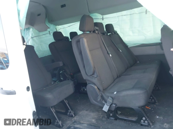 2018 Ford Transit Passenger XL z VIN 1FBAX2CM1JKA97858, wystawiony jako IAAI lot #41285058 z przebiegiem 252 805 mil mil oraz . Historia ofert i sprzedaży dostępna na DreamBid. Obrazek 8.