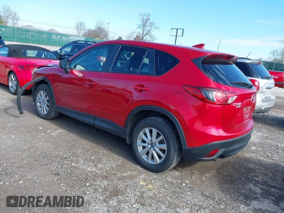 2016 Mazda CX-5 Touring with VIN JM3KE4CY5G0630438, listed as a IAAI auction lot 41877660 with 56,960 mi miles. Bid and sale history available at carsss.com. Image 3.