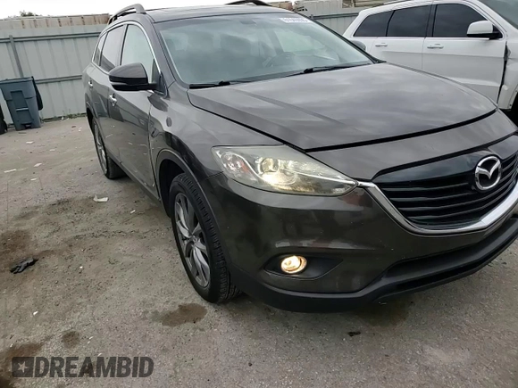 2015 Mazda CX-9 Grand Touring z VIN JM3TB2DA0F0468350, wystawiony jako Copart lot #61545095 z przebiegiem 154 050 mil mil oraz Szkoda całkowita • Salvage title. Historia ofert i sprzedaży dostępna na DreamBid. Obrazek 14.