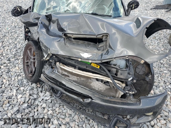 2011 MINI Hardtop S with VIN WMWSV3C55BTY20530, listed as a Copart auction lot 56016985 with Not Provided miles and Salvage Title. Bid and sale history available at DreamBid. Image 11.