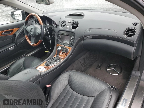 2011 Mercedes-Benz SL 550 with VIN WDBSK7BA8BF165312, listed as a Copart auction lot 51907465 with 32,057 mi miles and Salvage title. Bid and sale history available at DreamBid. Image 8.