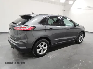 2021 Ford Edge SE z VIN 2FMPK4G95MBA23228, wystawiony jako Copart lot #51947405 z przebiegiem 80 522 mil mil oraz Czysty tytuł • Clean title. Historia ofert i sprzedaży dostępna na DreamBid. Obrazek 3.