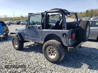2002 Jeep Wrangler Sport with VIN 1J4FA49S92P715480, listed as a Copart auction lot 55157545 with 153,560 mi miles and Clean Title. Bid and sale history available at carsss.com. Image 2.