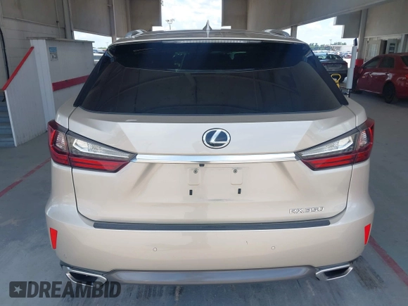 2016 Lexus RX 350 z VIN 2T2ZZMCA7GC026812, wystawiony jako IAAI lot #42470092 z przebiegiem 49 426 mil mil oraz . Historia ofert i sprzedaży dostępna na DreamBid. Obrazek 16.