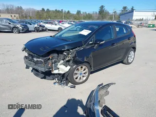 2013 Ford Fiesta SE with VIN 3FADP4EJ3DM178886, listed as a IAAI auction lot 41903300 with 135,817 mi miles and . Bid and sale history available at DreamBid. Image 2.