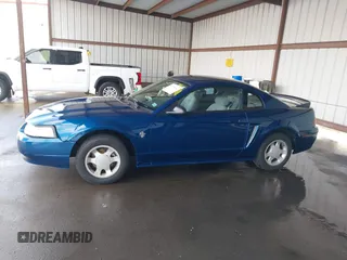 1999 Ford Mustang with VIN 1FAFP4040XF124637, listed as a IAAI auction lot 41793662 with 54,591 mi miles and . Bid and sale history available at DreamBid. Image 14.
