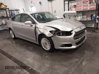 2014 Ford Fusion SE Hybrid with VIN 3FA6P0LU1ER227571, listed as a IAAI auction lot 42391487 with 127,979 mi miles and . Bid and sale history available at DreamBid. Image 1.
