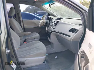 2014 Toyota Sienna L with VIN 5TDZK3DC6ES421278, listed as a IAAI auction lot 41178679 with 202,823 mi miles. Bid and sale history available at carsss.com. Image 5.