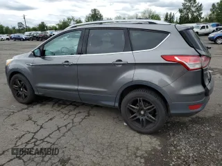 2013 Ford Escape Titanium с VIN 1FMCU9J92DUB97590, выставлен на аукционе Copart как лот 56235645 с пробегом 164 613 миль миль и Списание • Salvage title. История ставок и продаж доступна на DreamBid. Изображение 2.