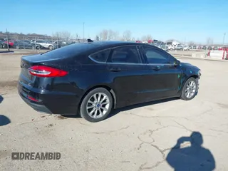 2020 Ford Fusion SE with VIN 3FA6P0LU1LR134904, listed as a IAAI auction lot 41448356 with 84,459 mi miles and . Bid and sale history available at DreamBid. Image 4.