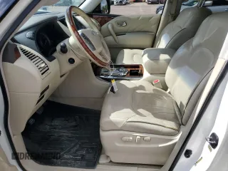 2015 Infiniti QX80 z VIN JN8AZ2NF0F9574531, wystawiony jako Copart lot #56172755 z przebiegiem 190 249 mil mil oraz Czysty tytuł • Clean title. Historia ofert i sprzedaży dostępna na DreamBid. Obrazek 7.