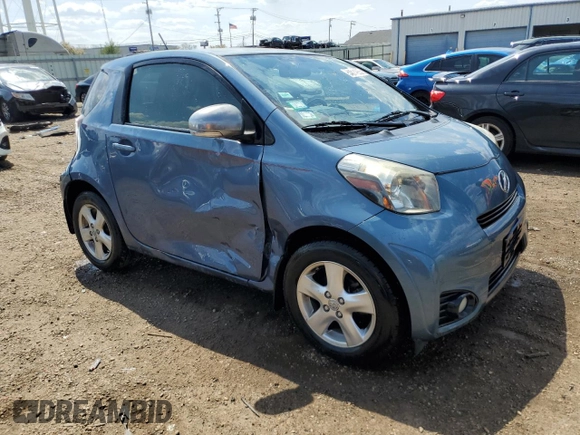 2012 Scion iQ z VIN JTNJJXB07CJ018481, wystawiony jako Copart lot #54014265 z przebiegiem 54 331 mil mil oraz Szkoda całkowita • Salvage title. Historia ofert i sprzedaży dostępna na DreamBid. Obrazek 4.