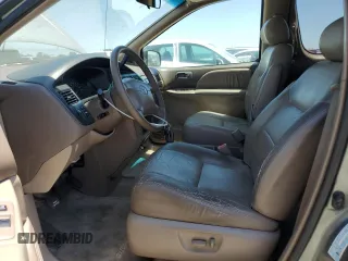 1998 Toyota Sienna LE with VIN 4T3ZF13C4WU064791, listed as a Copart auction lot 61411865 with 218,835 mi miles and Salvage title. Bid and sale history available at DreamBid. Image 7.