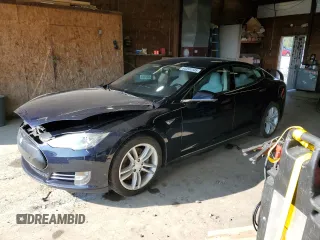 2014 Tesla Model S 60 z VIN 5YJSA1H16EFP43523, wystawiony jako Copart lot #63291145 z przebiegiem Nie podano mil oraz Czysty tytuł • Clean title. Historia ofert i sprzedaży dostępna na DreamBid. Obrazek 1.