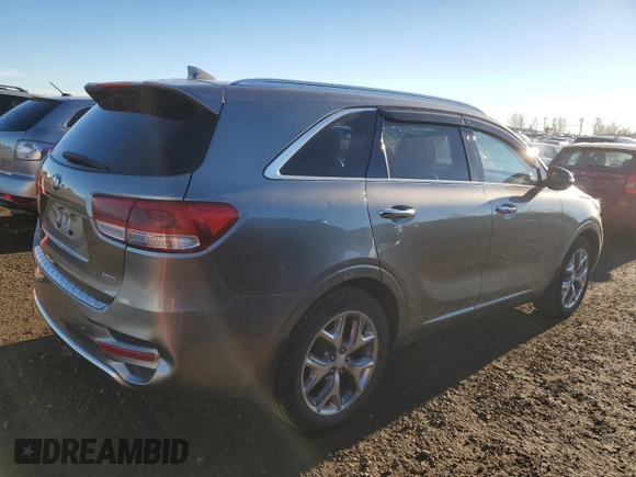 2016 Kia Sorento SXL z VIN 5XYPKDA15GG105354, wystawiony jako Copart lot #79710674 z przebiegiem 167 327 mil mil oraz Czysty tytuł • Clean title. Historia ofert i sprzedaży dostępna na DreamBid. Obrazek 3.