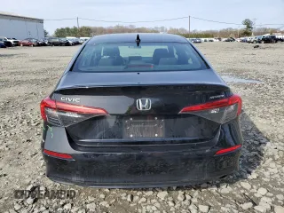 2023 Honda Civic Sport z VIN 2HGFE2F55PH508580, wystawiony jako Copart lot #53041855 z przebiegiem 59 509 mil mil oraz Szkody całkowita. Historia ofert i sprzedaży dostępna na DreamBid. Obrazek 6.