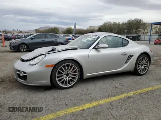 2006 Porsche Cayman S с VIN WP0AB29856U780159, выставлен на аукционе Copart как лот 47662295 с пробегом 122 489 миль миль и Списание • Salvage title. История ставок и продаж доступна на DreamBid. Изображение 1.