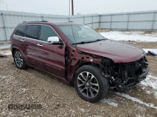 2018 Jeep Grand Cherokee High Altitude with VIN 1C4RJFCM4JC383396, listed as a Copart auction lot 82925024 with 129,624 mi miles and Salvage Title. Bid and sale history available at carsss.com. Image 4.