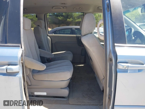 2007 Kia Sedona EX with VIN KNDMB233276158120, listed as a IAAI auction lot 42157778 with 222,920 mi miles. Bid and sale history available at carsss.com. Image 8.