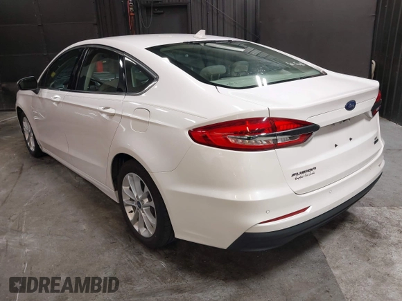 2020 Ford Fusion SE z VIN 3FA6P0LU8LR142370, wystawiony jako IAAI lot #42457342 z przebiegiem 53 808 mil mil oraz . Historia ofert i sprzedaży dostępna na DreamBid. Obrazek 3.