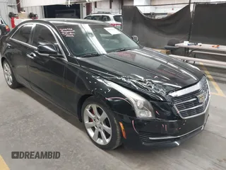 2016 Cadillac ATS Luxury Collection RWD z VIN 1G6AB5RX3G0128922, wystawiony jako IAAI lot #41829982 z przebiegiem 135 081 mil mil oraz . Historia ofert i sprzedaży dostępna na DreamBid. Obrazek 1.