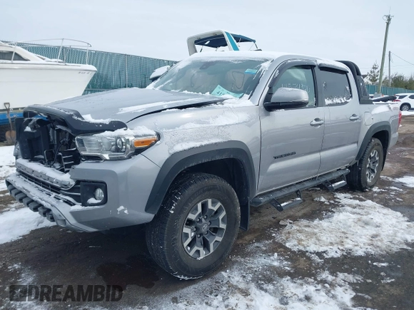 2019 Toyota Tacoma SR z VIN 3TMCZ5AN8KM211246, wystawiony jako IAAI lot #41574346 z przebiegiem 66 825 mil mil oraz . Historia ofert i sprzedaży dostępna na DreamBid. Obrazek 18.