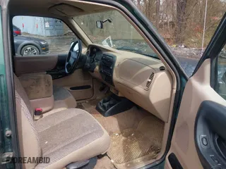2000 Ford Ranger XL with VIN 1FTYR14V6YTA24267, listed as a IAAI auction lot 41964509 with 140,436 mi miles. Bid and sale history available at carsss.com. Image 5.