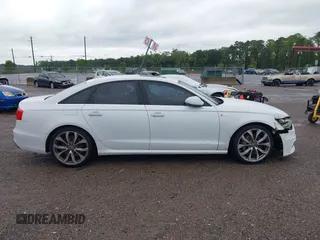 2013 Audi A6 Prestige with VIN WAUHGAFC2DN153202, listed as a IAAI auction lot 42242052 with 163,295 mi miles and . Bid and sale history available at DreamBid. Image 13.