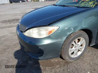 2004 Toyota Camry LE with VIN 4T1BF32K04U074276, listed as a IAAI auction lot 41940050 with 266,420 mi miles and . Bid and sale history available at DreamBid. Image 6.