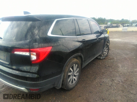 2021 Honda Pilot EX-L with VIN 5FNYF5H50MB011165, listed as a IAAI auction lot 39799892 with 95,040 mi miles and . Bid and sale history available at DreamBid. Image 4.