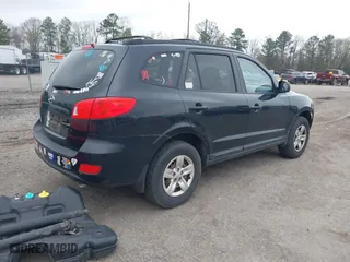 2009 Hyundai Santa Fe GLS with VIN 5NMSG13D69H279184, listed as a IAAI auction lot 41944760 with 242,065 mi miles. Bid and sale history available at carsss.com. Image 4.