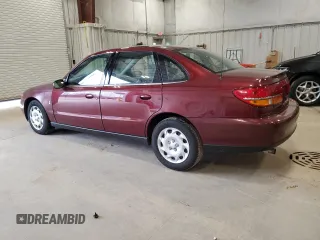 2001 Saturn LS z VIN 1G8JU52F51Y549021, wystawiony jako Copart lot #81109084 z przebiegiem 14 974 mil mil oraz Tytuł czysty. Historia ofert i sprzedaży dostępna na DreamBid. Obrazek 2.