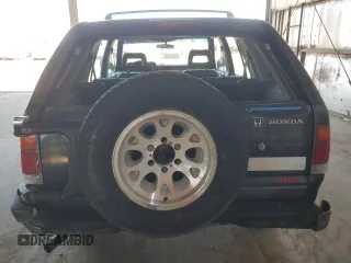 1995 Honda Passport z VIN 4S6CY58V4S4406803, wystawiony jako Copart lot #73057084 z przebiegiem 161 118 mil mil oraz Szkody całkowita. Historia ofert i sprzedaży dostępna na DreamBid. Obrazek 6.