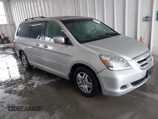 2006 Honda Odyssey EX-L z VIN 5FNRL38716B066942, wystawiony jako IAAI lot #42121931 z przebiegiem 96 484 mil mil oraz . Historia ofert i sprzedaży dostępna na DreamBid. Obrazek 1.