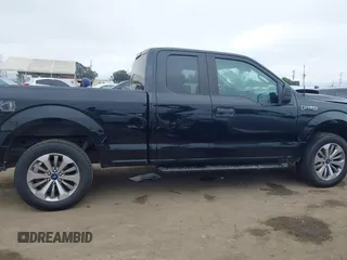 2018 Ford F-150 XL with VIN 1FTEX1EP6JKF59667, listed as a IAAI auction lot 42410311 with 134,385 mi miles and . Bid and sale history available at DreamBid. Image 13.