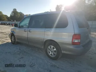2004 Kia Sedona LX with VIN KNDUP131346508490, listed as a Copart auction lot 77391594 with 41,211 mi miles and Salvage Title. Bid and sale history available at carsss.com. Image 2.