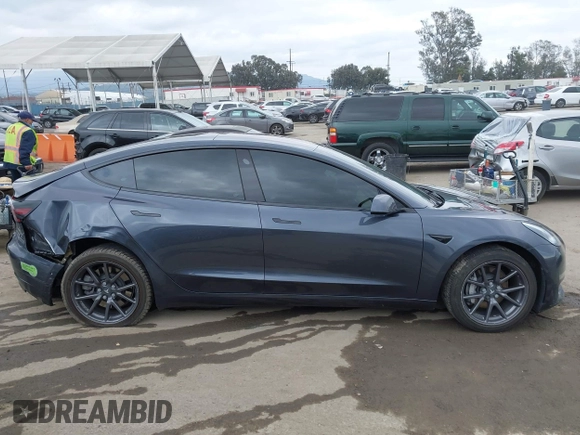2018 Tesla Model 3 Long Range Battery with VIN 5YJ3E1EA0JF101564, listed as a IAAI auction lot 41902214 with 101,581 mi miles. Bid and sale history available at carsss.com. Image 13.