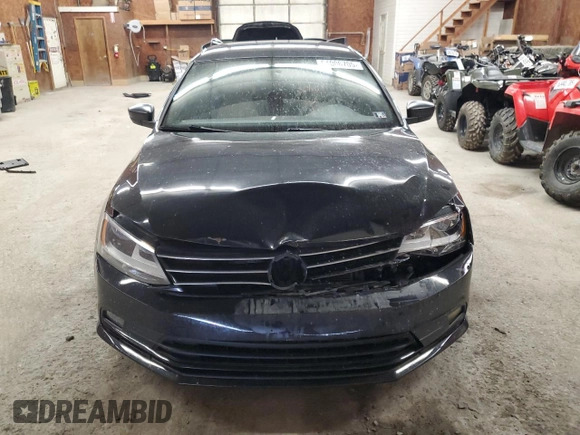 2015 Volkswagen Jetta SE with VIN 3VWD17AJ7FM213318, listed as a Copart auction lot 64006705 with 116,741 mi miles and Salvage title. Bid and sale history available at DreamBid. Image 5.