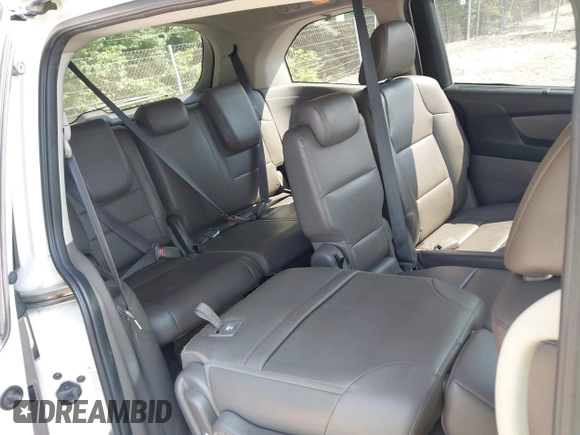 2014 Honda Odyssey EX-L with VIN 5FNRL5H63EB131596, listed as a IAAI auction lot 42402427 with 106,156 mi miles and . Bid and sale history available at DreamBid. Image 8.