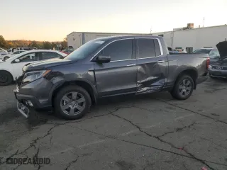 2020 Honda Ridgeline RTL-E with VIN 5FPYK3F73LB010893, listed as a Copart auction lot 82676714 with 71,903 mi miles and Salvage Title. Bid and sale history available at carsss.com. Image 1.