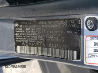 2005 BMW 3 Series 330i with VIN WBAEV53485KM39295, listed as a Copart auction lot 61581235 with 185,054 mi miles and Salvage title. Bid and sale history available at DreamBid. Image 12.