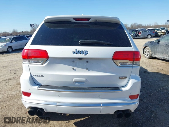 2018 Jeep Grand Cherokee Summit with VIN 1C4RJFJT4JC212819, listed as a IAAI auction lot 41975614 with 88,112 mi miles and . Bid and sale history available at DreamBid. Image 17.